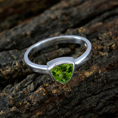 Saanvi green stone solitaire ring with a triangular green gemstone set in silver band