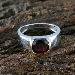 Saanvi sterling silver ring with deep cushion cut red gemstone luxurious red solitaire ring on rustic wood