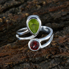 Ananya sterling silver ring with pear peridot and round garnet gemstones luxurious toi et moi ring with double band design