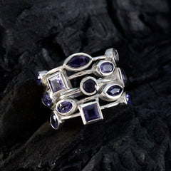 Siti modern blue gemstone ring with multiple purple-blue stones set in silver bands