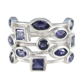 Siti modern blue gemstone ring with multiple blue stones in various shapes set in silver bands