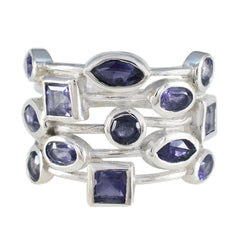 Siti modern blue gemstone ring with multiple blue stones in various shapes set in silver bands