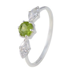 Hana modern green gemstone ring with round green center stone and two marquise clear stones on silver band