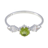 Hana modern green gemstone ring with silver band and clear side stones