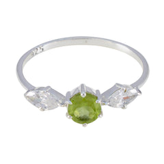 Hana modern green gemstone ring with silver band and clear side stones