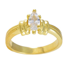 Rina modern white solitaire ring with pear-shaped clear stone set on gold band