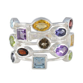 Joaquina multicolor gemstone cocktail ring with various oval and square gemstones set in silver band