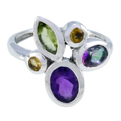 Saanvi multicolor gemstone cocktail ring with purple, green, yellow, and iridescent stones in silver setting