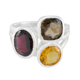 Ava multicolor gemstone cocktail ring featuring three large oval gemstones in silver setting