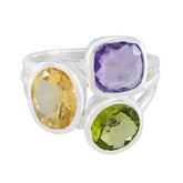 Camilla multicolor gemstone cocktail ring with purple, yellow, and green stones in silver setting