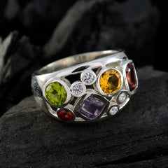 Putri multicolor gemstone ring with green, yellow, purple, red, and clear stones in silver setting