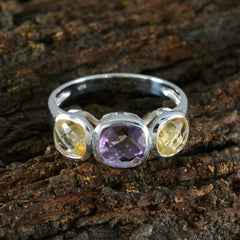 Priya silver ring with central amethyst and two citrine stones on rustic wood multicolor gemstone ring for women