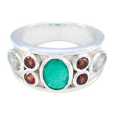 Natcha silver band multicolor gemstone ring with green, red, and clear stones in oval settings