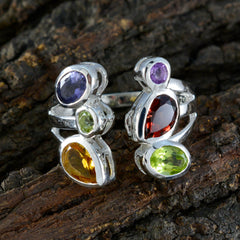 Nisa multicolor gemstone ring with purple, red, green, and yellow stones set in silver band