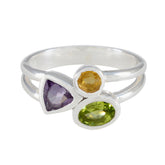 Julieta multicolor gemstone trilogy ring with purple, yellow, and green stones set in silver band