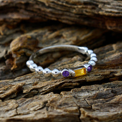 Xiu multicolor gemstone trilogy ring silver beaded band with two purple stones and a rectangular yellow gem