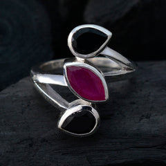 Priya multicolor gemstone trilogy ring with two black and one pink marquise-shaped stones on silver band