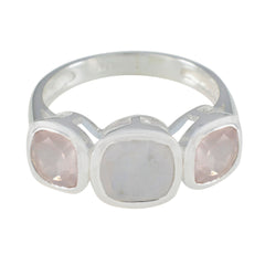Ines multicolor gemstone trilogy ring with two pink stones and one white stone on silver band