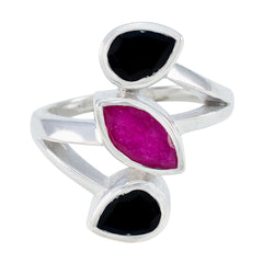 Priya multicolor gemstone trilogy ring with two black and one pink gemstone set in silver band