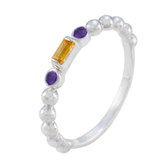 Xiu silver beaded band ring with rectangular yellow center stone and two purple accents multicolor gemstone trilogy ring