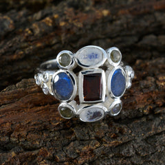Kristine silver multicolor Navratna ring with central rectangular red stone and surrounding blue white green gems