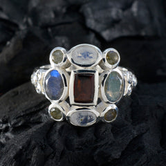 Kristine multicolor Navratna ring silver band with central rectangular red stone and surrounding blue and yellow gems