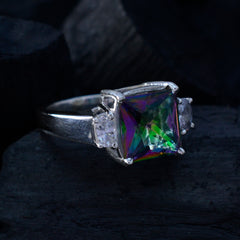Laura multicolor trilogy ring with a square iridescent center stone and two clear side stones on silver band
