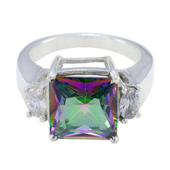 Laura multicolor trilogy ring with a square multicolor center stone and two clear side stones in silver setting