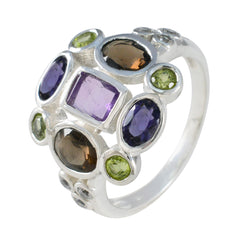 Meera navratna cocktail ring with multicolor gemstones set in silver band