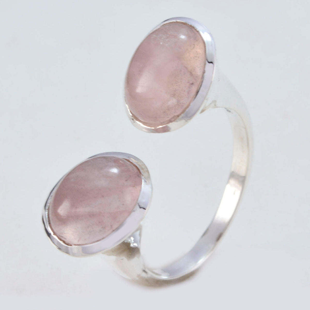 Araya pink toi et moi ring with two rose quartz cabochons set in polished silver open band