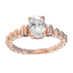 Min seo rose gold ring with oval clear center stone and tiny side purple accents purple gemstone fashion ring