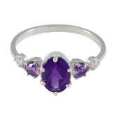 Julia silver ring with pear cut purple center triangular side purple gems and clear accents purple gemstone trilogy ring