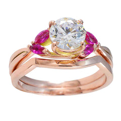 Fernanda rose gold ring with large clear center stone and marquise red side gems red gemstone ring for women