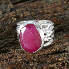 Elena red gemstone solitaire ring with a large oval red gemstone set in a silver band