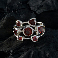 Bianca silver multi stone red gemstone statement ring featuring mixed cut red gemstones on a layered band