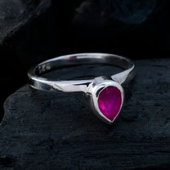 Ying red solitaire ring for women with teardrop shaped red gemstone set in silver band