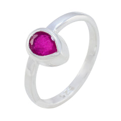 Ying red solitaire ring for women with teardrop-shaped red gemstone set in silver band