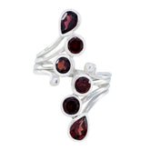 Yasmin trendy red gemstone ring featuring multiple pear and round red gemstones set in silver