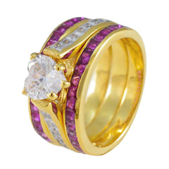 Isadora gold ring with solitaire crystal and dual pave red stone bands trendy red gemstone ring