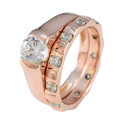Araya trendy white gemstone ring featuring a rose gold band with multiple sparkling white stones