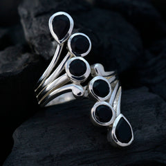 Violet black gemstone ring with multiple black stones set in silver bands by Violet