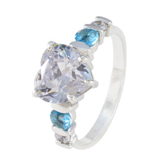 Nova white gemstone heart ring in sterling silver with large heart center stone and blue accent hearts