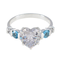 Nova silver band ring with white gemstone heart ring center and blue side stones with clear accent stones for romantic gifting