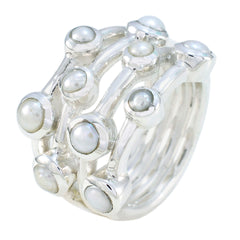 Ivy white gemstone stacked rings featuring multiple white gemstones set in silver bands