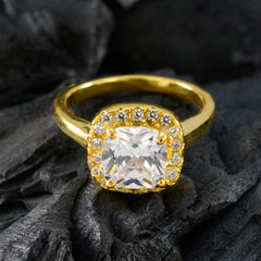 Ananya gold ring featuring a white halo ring for women with a large square center stone and surrounding smaller diamonds