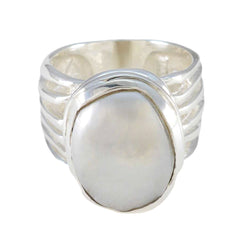 Ella white solitaire statement ring with large smooth oval stone and textured silver band