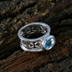 Isabella Irish blue solitaire ring with intricate Celtic knot design in silver band