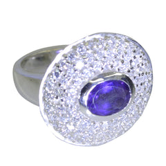 Lakshmi purple halo ring with a central purple gemstone surrounded by sparkling clear crystals