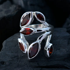 Liyana leaf design red gemstone ring featuring multiple marquise-cut red stones set in silver band