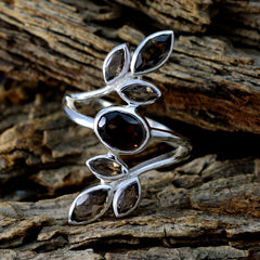 Maya leafy brown gemstone ring sterling silver vine style ring with oval and marquise smoky brown stones on rustic wood